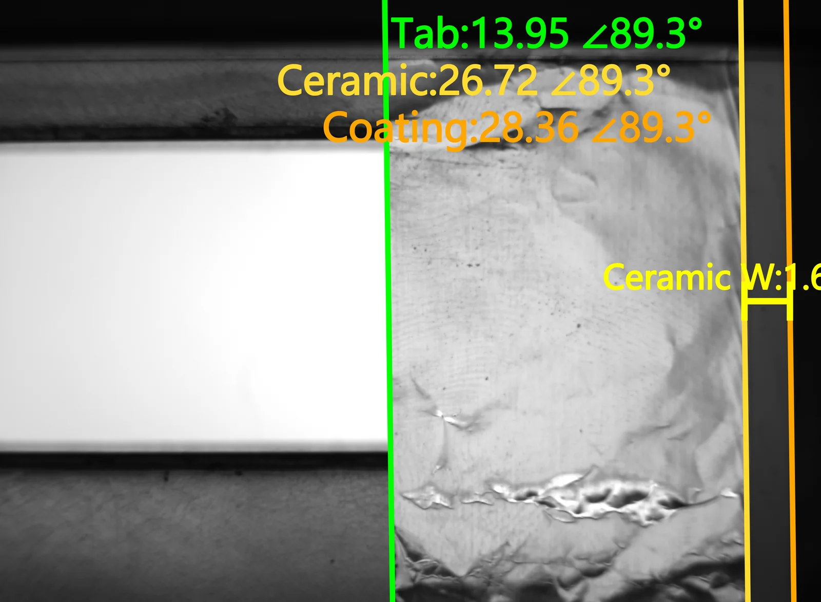 Full-resolution annotated frame: tab, ceramic and coating edges